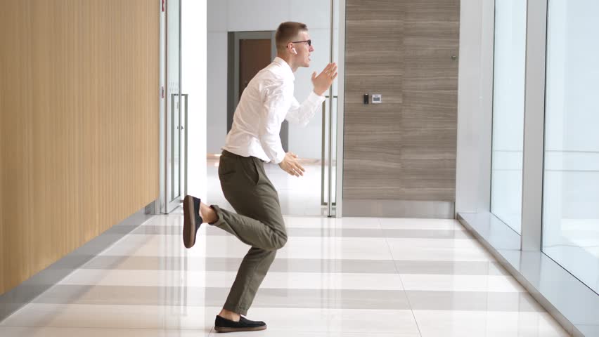 Happy Successful Businessman Dancing In Wireless Earphones | Shutterstock HD Video #1008204928