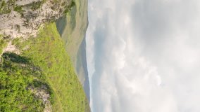 Vertical video. Clouds over the Grand Canyon of Crimea. Time Lapse