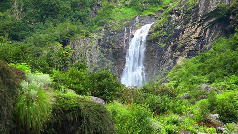 View of a beautiful high waterfalls in Ghangaria, Uttrakhand, India