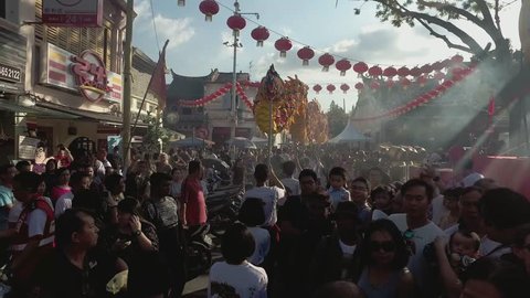 GEORGETOWN, PENANG/MALAYSIA - 25 FEB 2018: Performance dragon dance walk into the crowd during chinese new year.