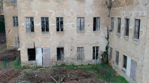 VOLTERRA, ITALY - FEBRUARY 2018: Abandoned asylum aerial view. The facility was closed in 1984.