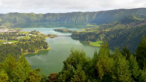 Sete Cidades, civil parish, that is likewise located in the center of a massive volcanic crater with lake, also referred to as Sete Cidades. Sao Miguel Island, Portuguese archipelago of the Azores.