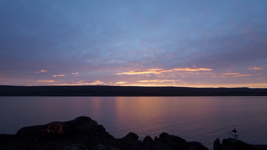Beautiful Iceland sunset on peaceful lake | Shutterstock HD Video #1008251908