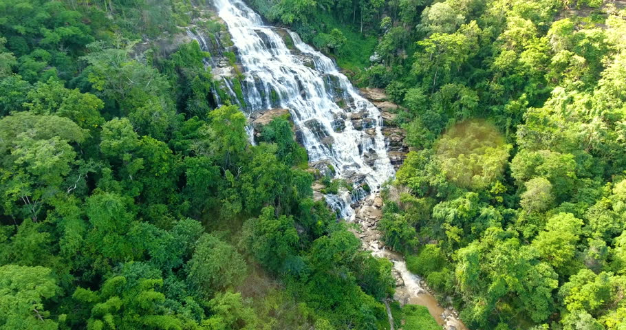 Aerial view of Maeya Waterfall , large waterfall located deep in forest of Chiang Mai, north of Thailand. The beautiful cascade of this waterfall gives a fresh nature landcape for all jungle tourists.