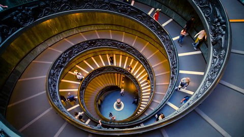 Vatican, Rome, Italy - Oct 5, 2017: People on Bramante Staircase in Vatican Museums in the Vatican City , Rome , Italy . The double helix staircase is is the famous travel destination.