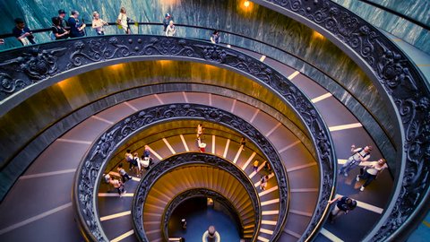 Vatican, Rome, Italy - Oct 5, 2017: People on Bramante Staircase in Vatican Museums in the Vatican City , Rome , Italy . The double helix staircase is is the famous travel destination.