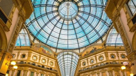 Milan, Italy - Sep 28, 2017: Time lapse of people in Galleria Vittorio Emanuele II, Milan, Italy. It is Italy oldest mall in Milan. Galleria is named after Victor Emmanuel II, the first king of Italy.