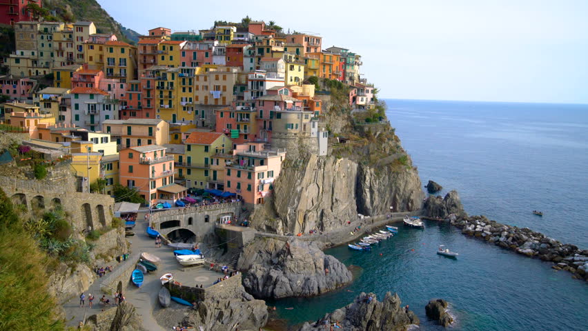 Manarola Village, Cinque Terre Coast of Italy. Manarola is a small town in the province of La Spezia, Liguria, northern Italy and one of the five Cinque terre attractions to tourist visiting Italy. Royalty-Free Stock Footage #1008279208