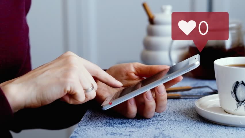 Collecting likes concept. Woman touching the screen of smartphone, hearts are flying out. Social media animation.  | Shutterstock HD Video #1008284536