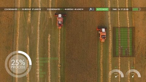 Harvester removes oats, two hybrid electric combine, hud, view from height, motion graphics elements.
