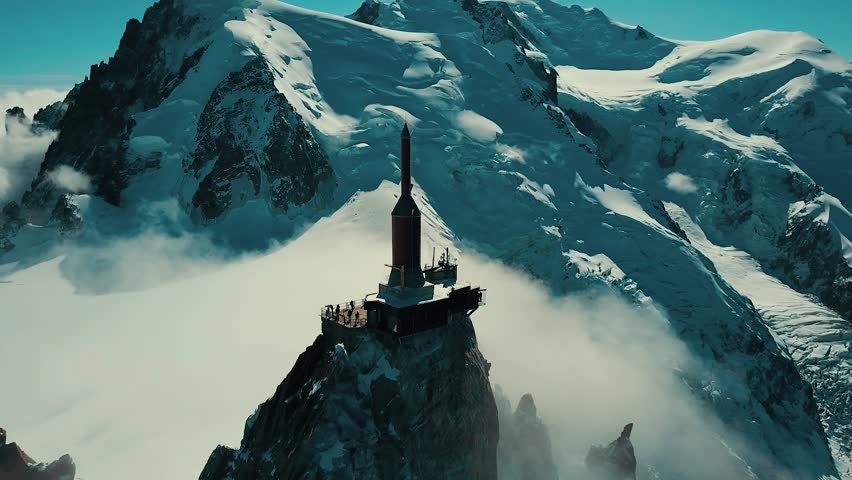 Chamonix Mont Blanc epic aerial view.  Highest mountain in the Alps. Beautiful mountain landscapes. Ski resorts in France. Mountain climbing. Paragliding.