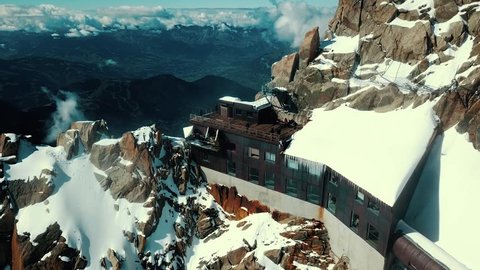 Chamonix Mont Blanc epic aerial view.  Highest mountain in the Alps. Beautiful mountain landscapes. Ski resorts in France. Mountain climbing. Paragliding. Arkistovideo