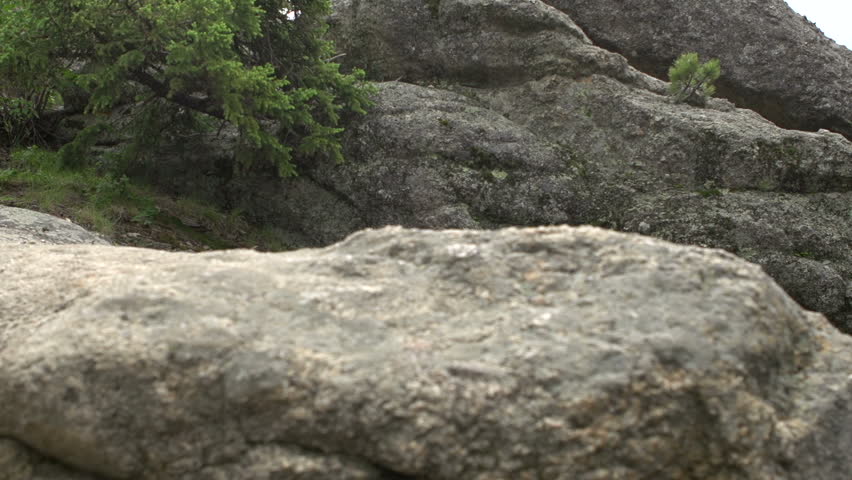 Rocks in mountain pan to lake