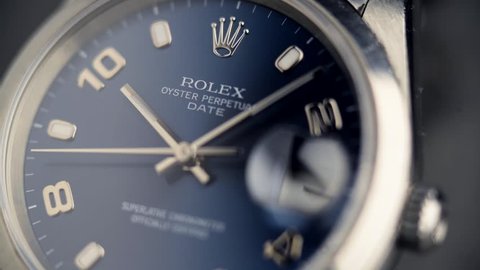 BOLOGNA, ITALY - MARCH 5, 2018: Rolex Oyster Perpetual Date watch. Rolex SA is a Swiss luxury watchmaker, founded by Hans Wilsdorf and Alfred Davis in London, England in 1905. Illustrative editorial. 