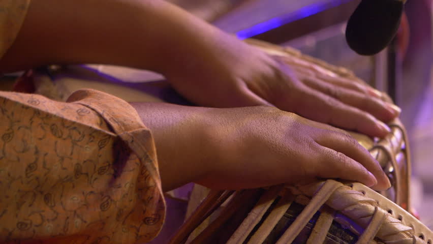 Indian musician playing tabla drum shot in slow motion 100 fps. Royalty-Free Stock Footage #1008329206