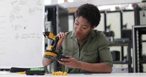 Female working on robotics
