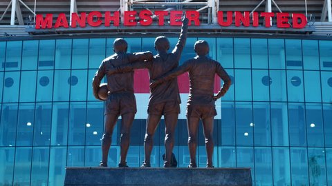 Manchester,UK - 4 May 2017: Statue Of Players Outside Old Trafford Football Stadium In Manchester