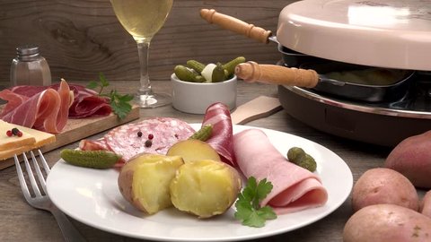 raclette cheese with potato and ham