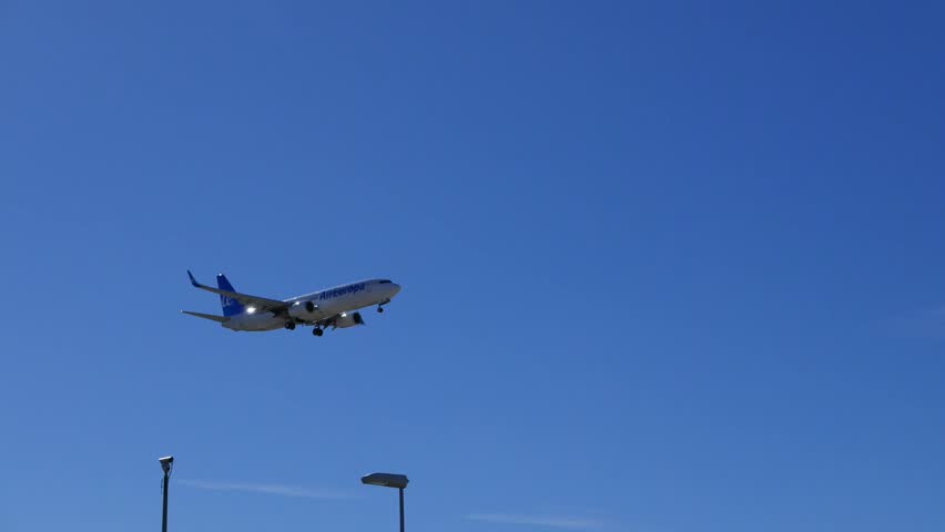 VALENCIA, SPAIN - MARCH 7, 2018: An Air Europa flight arriving at the Valencia Airport on schedule. Air Europa is the third largest Airline in Spain after Iberia and Vueling Airlines.