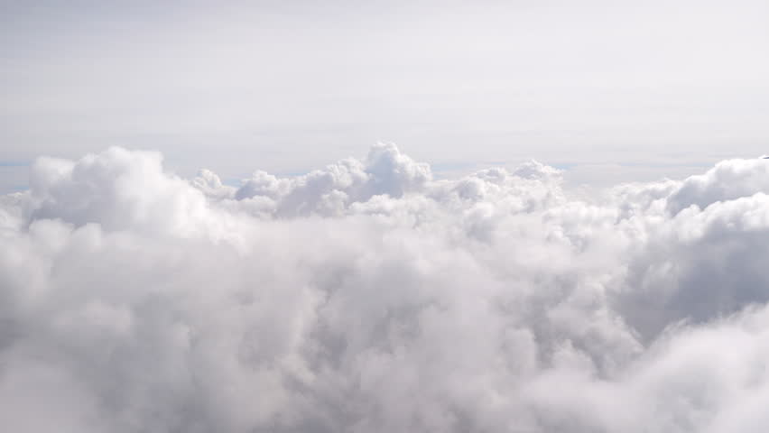 Aerial shot above the clouds in 4K | Shutterstock HD Video #1008413080