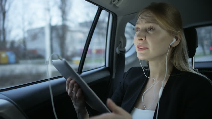 Woman Irritated During a Skype Conversation in the Car | Shutterstock HD Video #1008415408