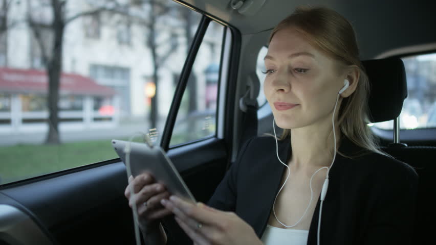 Woman Starting a Skype Conversation in the Immobile Car | Shutterstock HD Video #1008415459