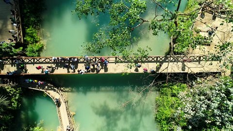 
4k Video shot aerial view by drone. Kuang Si Waterfall Famous Landmark Nature Travel Place Of Luang Prabang City, Laos. Bird eye view landscape.