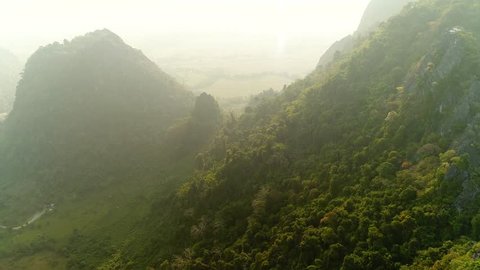 4k Video shot aerial view by drone. Pha Ngern View Point in Vang vieng, Laos. Landscape Mountain of Vang Vieng. sunrise