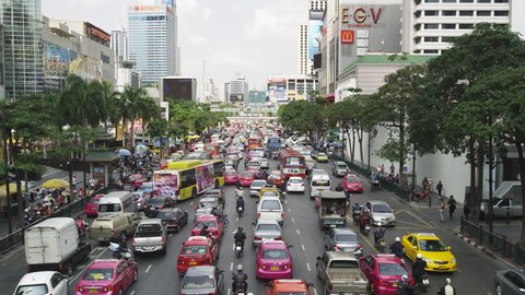 BANGKOK, THAILAND - FEBRUARY 3, 2013: Early Afternoon traffic on Rachadamri Street
