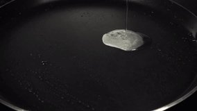 Egg falling on hot frying pan, 480 fps slow motion, full hd video footage