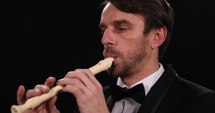 Mature Instrumentalist Man Playing Recorder Flute Performing Woodwind Orchestra