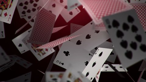 Animation falling playing cards and casino chips from light beams on dark shadow. Animation of seamless loop.