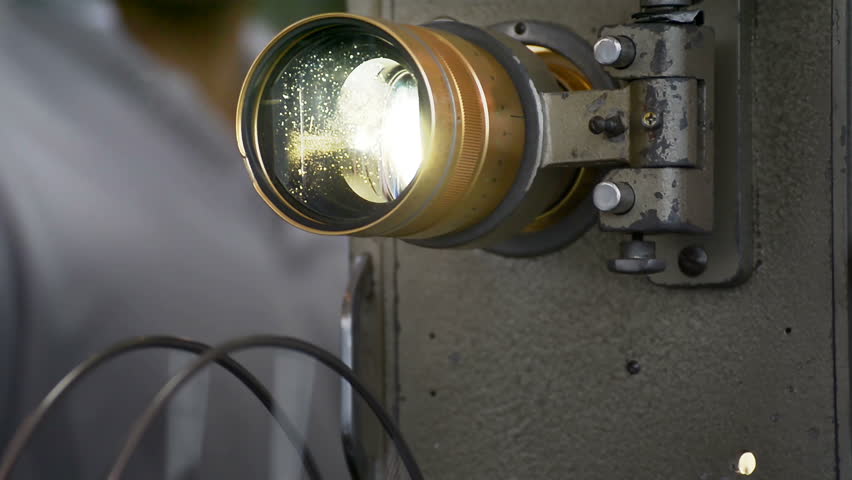 old movie cinema film projector of 8mm. and 16 mm. Vintage retro technology concept. old analog projectors are still used at some places. common type of projector used today is called video projector.
