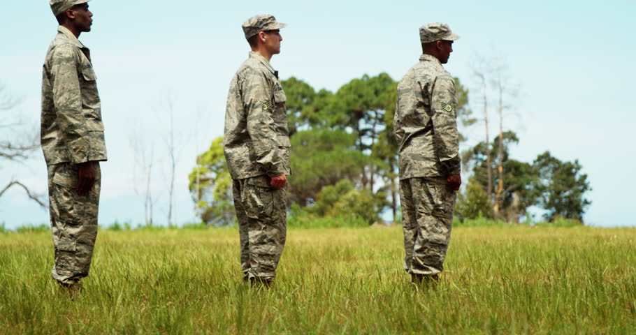 Group of military soldiers standing in line at boot camp 4k