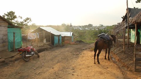 PUERTO LIBERTADOR, COLOMBIA - FEBRUARY 24, 2014: VIEW OF RURAL AREA AT REFUGEE CAMP
