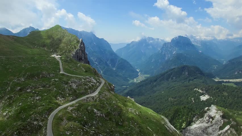 AERIAL VIEW: flight around Mangart Pass.Slovenia. camera moving forwards Royalty-Free Stock Footage #1008490537
