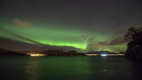 Aurora Borealis over fjord