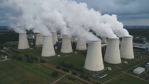 Static drone shot of huge lignite (brown coal) fired power station in Eastern Germany, heavy air pollution in Europe