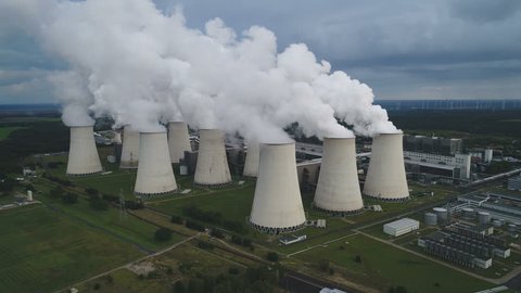 JANSCHWALDE, GERMANY - SEPTEMBER 2017: Static drone shot of huge lignite (brown coal) fired power station in Eastern Germany, heavy air pollution in Europe