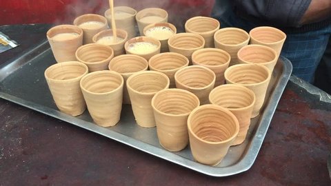 Garam Chai Poured into Clay Cups