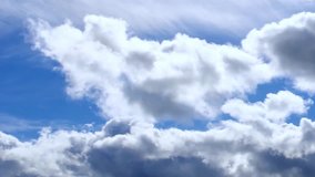White time lapse clouds, blue sky. Time lapse clip of white fluffy clouds over blue sky, Towering Cumulus Cloud Billows Time Lapse. Ultra HD, 3840x2160, 30 FPS, UHD.