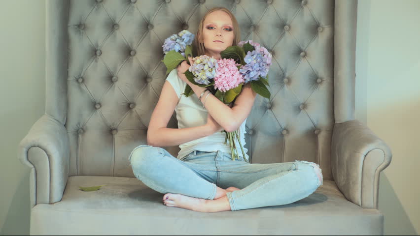 Magnificent portrait of a beautiful young woman with perfect skin closeup. Blonde woman with amazing eyes. Fashion model. Beauty 