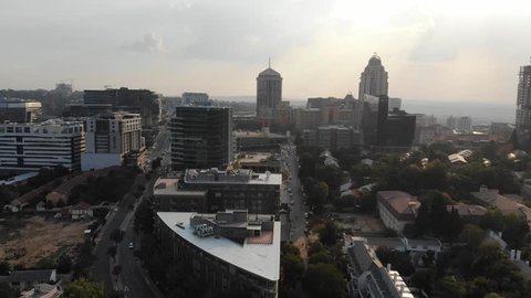 Sandton, Johannesburg / South Africa - March 2 2018: Flying over downtown Sandton, the economic hub of Johannesburg, late on an autumn afternoon