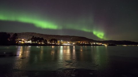 Illuminated lake with Northern Lights