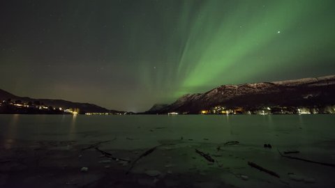 Frozen lake with Northern Lights