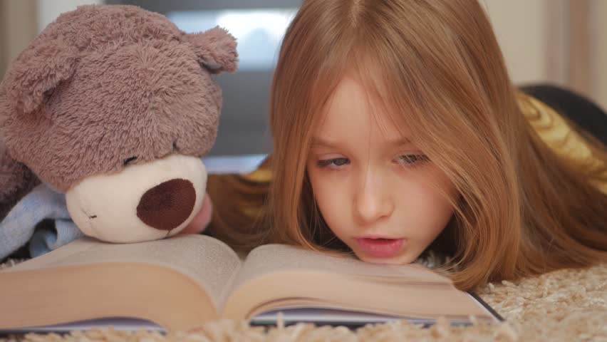 cute girl with teddy