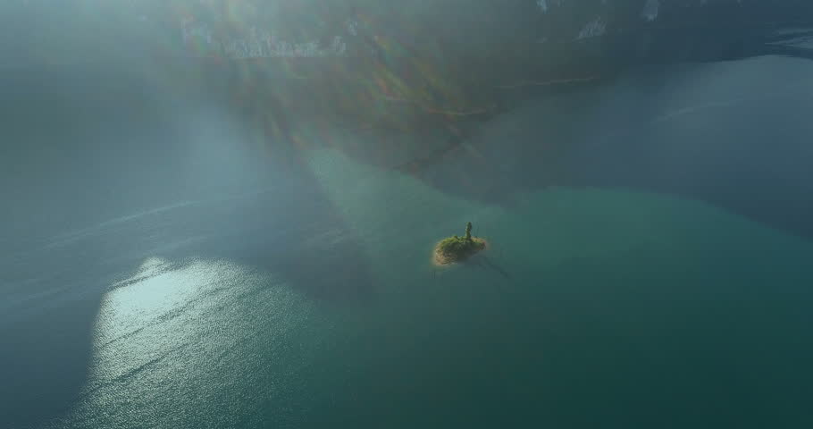 Aerial drone view of small rock on the lake in Khao Sok National Park, Surat Thani, Thailand
