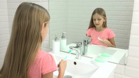 Child Brushing Teeth in Bathroom, Girl Washing with Toothbrush, Kid in Mirror 4K