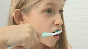 Child Brushing Teeth in Bathroom, Girl Washing with Toothbrush, Kid in Mirror