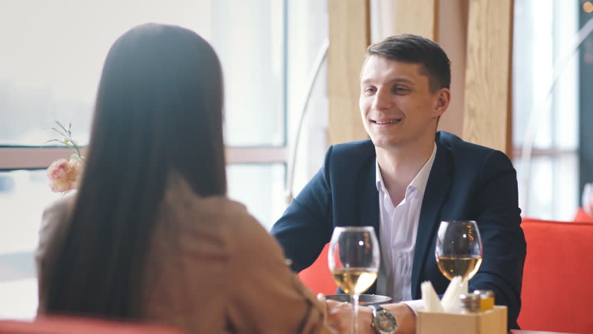 Couple celebrate Valentine's day with romantic dinner in restaurant